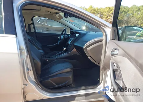 2012 Ford Focus Titanium z USA, uszkodzony, nr VIN 1FAHP3J20CL444584